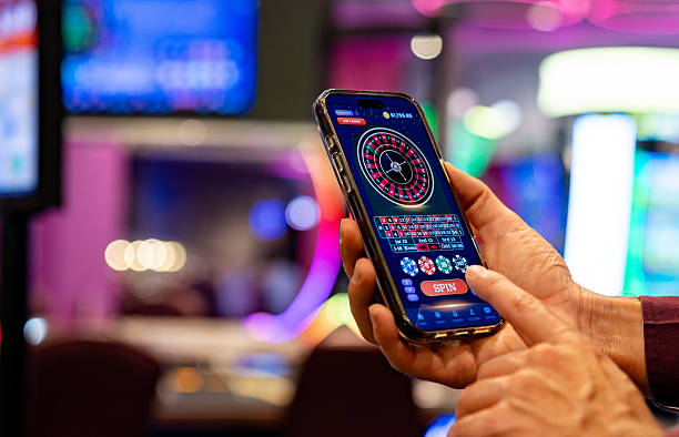 Mobile tanganjudi app showing Piala Asia tournament bracket and live-betting notifications